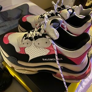 Balenciaga chunky sneakers. Also known as Triple S